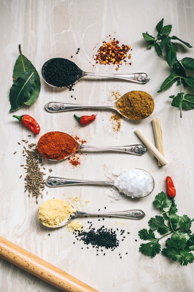 Colorful spices in spoons